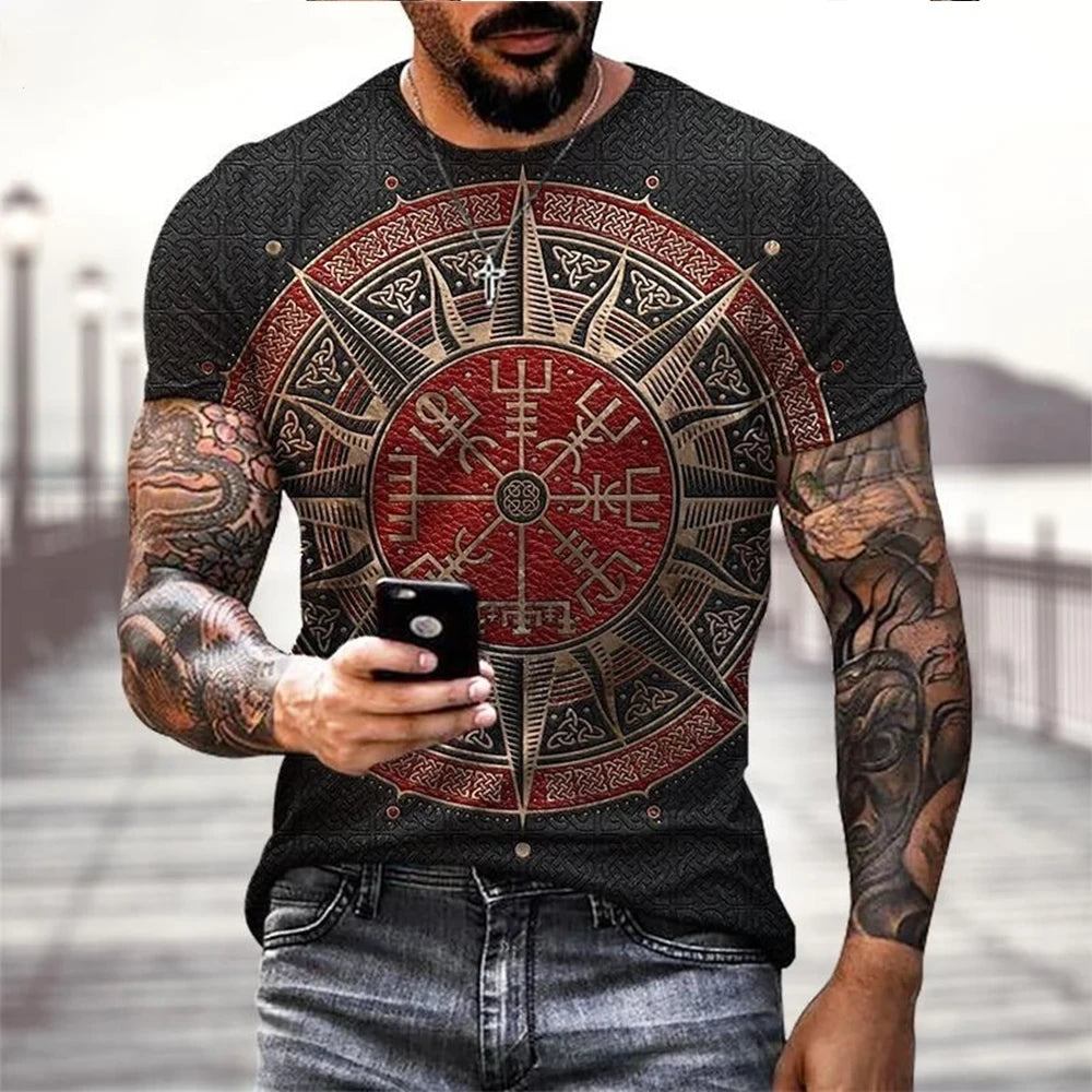 black t-shirt with a red and gold compass design